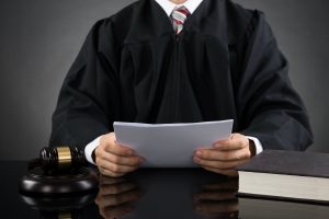 Judge reading document