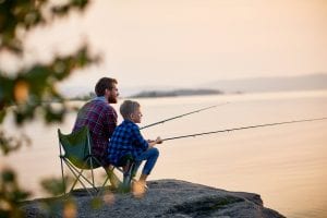 Father fishing with son