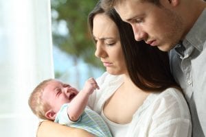 Parents with crying baby